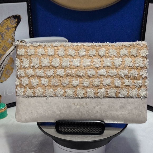 henri bendel Handbags - Henri Bendel Raffia Clutch/ Wristlet With Flower Pom Poms & Leather Bottom 🔥